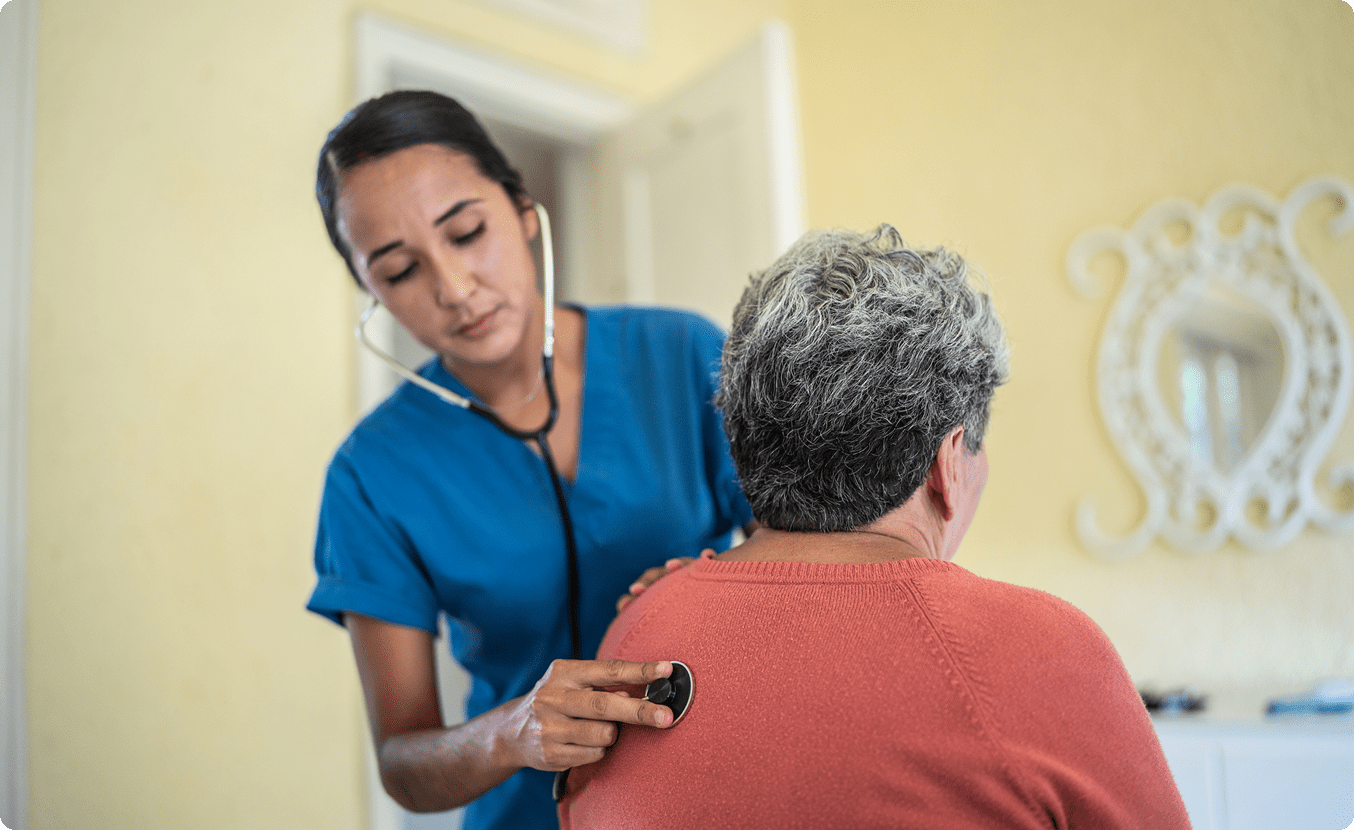 Medical check-up with stethoscope and patient