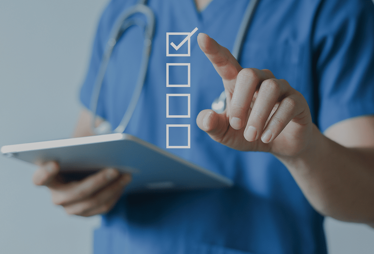 Medical staff with tablet and checklist
